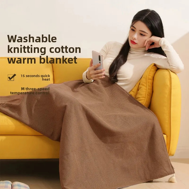Heated blanket shawl connected to a USB power bank